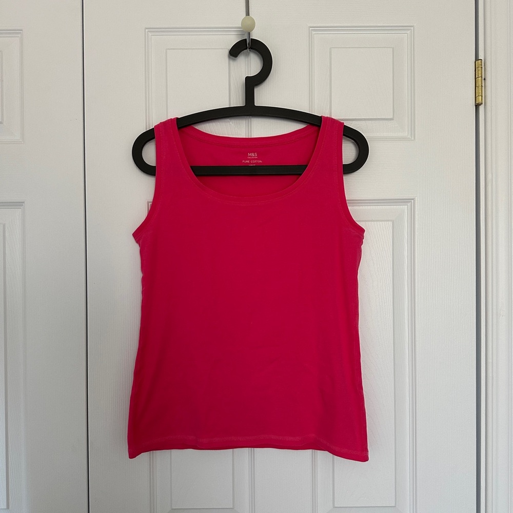 Barbie pink tank top.